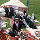 Фото из архива Жамбы Карыбековой. Жамбы Карыбекова (с орденами) на одной из выставок